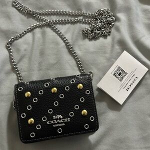 Coach Black and Silver Crossbody Bag with Gold Accents